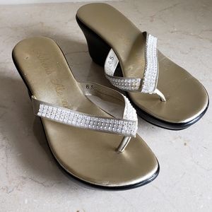 Althena Alexander flip flops